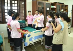 Fatima-Zahra Benyahia (first from right holding a camera) international UN Volunteer Partnership and Innovation Specialist with UNFPA in Lao People’s Democratic Republic documents UNFPA's work with midwives in Savannakhet in July 2022.