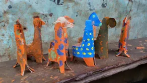 Paper giraffes made by children.