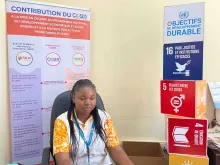 Yé Lossi Clementine, 32, a National UN volunteer with UNDP in Burkina Faso, in her office