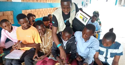 Volunteers raise awareness of education in the Democratic Republic of the Congo. Photo referenced in the 2026 SWVR.