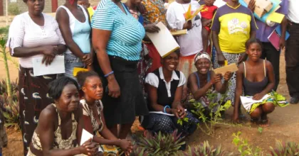 International UN Volunteer, Kirsti Mukwiilongo with UNHCR (wearing a blue cap) alongside refugee women at Sungui Refugee Camp in Bengo Province, Angola, in 2008. 