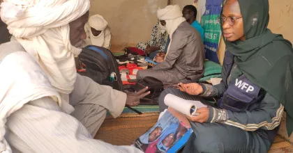 Volunteers support communities in accessing basic human services. Photo from Mali referenced in the 2026 SWVR.