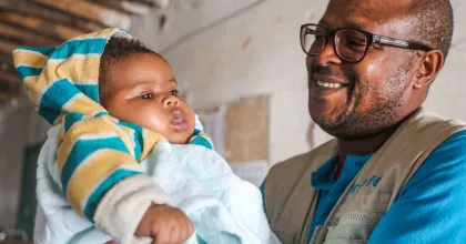 Amid the ongoing conflict in Sudan, Chad hosts the largest refugee population in Central Africa and responds to the humanitarian crisis through a range of UN-supported projects. Pictured here is a UN Volunteer gynaecologist from Burundi serving communities in Chad's Kanem Province. 