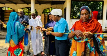 A national UN Volunteer with UNDP in Tanzania, Rahma Ally Juma, mobilizes coastal communities for the Bahari Maisha project and supports sustainable aquaculture—sea cucumber, sea moss, and crab farming—to improve the livelihoods of women and youth.