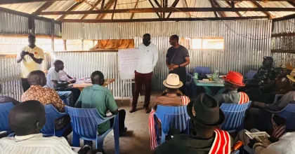 Pictured on the right, wearing a black shirt, UN Volunteer Civil Affairs Officer with UNMISS, Morris Charumbira, during a training session on reconciliation and trauma healing in Leer County, Unity State.