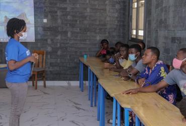 Hermine Bokossa, one of the UNV Youth talking about  sexual and reproductive health to young students Calavi