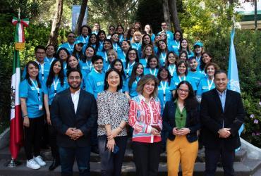 Ms Yokosuka and Ms Paparoni alongside UN Volunteers and UN partners in Mexico