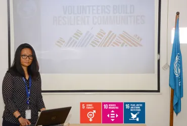 Trishna Bantawa (Nepal), UN Volunteer Field Coordination Officer with UNAMA makes a presentation about how volunteers build resilient communities, on the occasion of International Volunteer Day 2018.