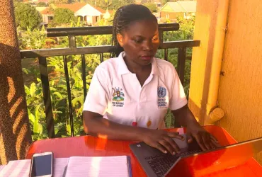 Annet Nakaliti, national UN Volunteer with UNFPA in Uganda, working from home due to impact of COVID-19.