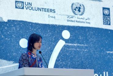 Ms Kyoko Yokosuka, UNV Deputy Executive Coordinator, addresses the audience at the high-level International Volunteer Day (IVD) event in Baghdad, Iraq.