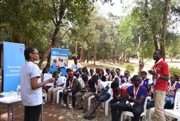 Barbra Matu, national UN Volunteer with UNEP, is interacting with a participant during the Kenya Scouts training (2017).