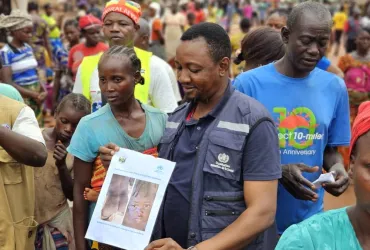 Community volunteers raise awareness of measles epidemic in Bangassou, Central African Republic. Photo referenced in the 2026 SWVR.