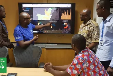 Jean Paul Kimenyi, UN Volunteer Epidemiologist at WHO Congo presenting analysis on new risks of disease outbreak in Congo.