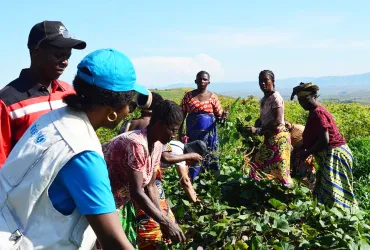 Astrini Simanjuntak (left) during a mission to Kalemie, Tanganyika, with women association members supported by the Education Cannot Wait project on income-generating activities.