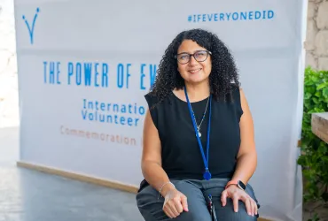 Ereny Elea Hanna Zarif, international UN Volunteer Electoral Field Coordination Specialist with United Nations Assistance Mission in Somalia speaks about her volunteer experience at International Volunteer Day in Mogadishu on 5 December 2023. 