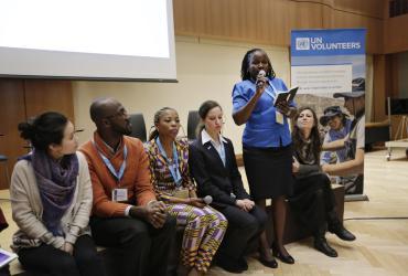 Judith Otieno, international UN Volunteer Gender Programme Analyst, speaks during the side event ‘Women, Peace and Volunteerism: Partnerships for Sustaining Peace’ held at the Permanent Mission of Germany to the UN.