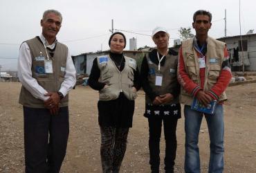 Volunteers of Handicap International in Domiz camp in Iraqi Kurdistan