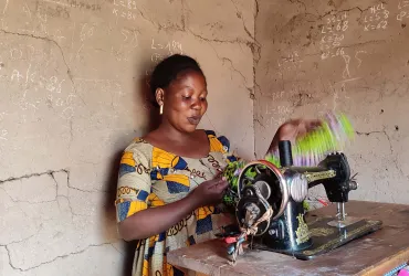 Deborah Kahambu, a former combatant with an armed militia now runs a sewing workshop in Lubero territory in the DRC. 