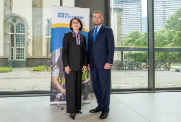 Gulbara Sultanova, Chair of the Civil Society Affairs Committee of Kazakhstan's Ministry of Culture and Information, and Toily Kurbanov, UNV Executive Coordinator at the Asian Partner Roundtable at UN Bonn.