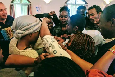 Participants in the Assignment Preparation Training in Kenya engage in a role play.