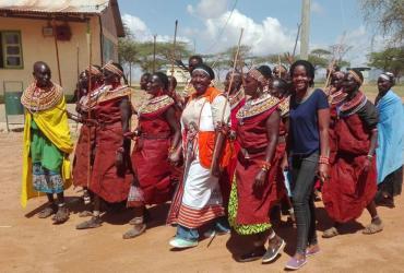 UN Volunteer Child Protection Officer with UNICEF, Faith Manyala, with women from Samburu community during a declaration ceremony to support the abandonment of female genital mutilation (FGM) in a bid to protect children from harmful cultural practices. 