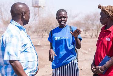 A UN Community Volunteer in Kakuma Refugee Camp during a community service activity through the UNHCR-UNV Refugee Outreach Volunteers Project.