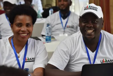 Castro Barasa (right), one of the 12 UN Volunteer Peace Coordinators, during the Kenya Government induction training with one of the 200 government-recruited peace monitors.