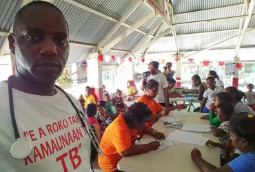 UN Volunteer Dr Innocent Nyandwi at an active case-finding community programme for TB. Such activities are key to effectively control TB, but have been disrupted due to the COVID-19 pandemic. 