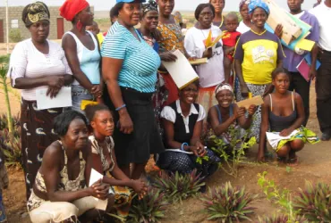 International UN Volunteer, Kirsti Mukwiilongo with UNHCR (wearing a blue cap) alongside refugee women at Sungui Refugee Camp in Bengo Province, Angola, in 2008.