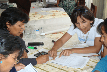Elsa del Carpio, national UN community Volunteer in Tarija, Bolivia, reviews the municipal budget allocations and analyses the allocations for gender equality.