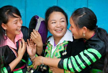 Volunteers make an impact on the daily life of minority groups and communities. These women live around Xam Neua, Hmong village, in Lao PDR, and were beneficiaries of a project against drugs conducted by UNODC, with the engagement of UN Volunteers.