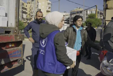 UN Volunteer Field Monitoring Assistants with the World Food Programme build the capacity of community volunteers, including refugees, to support food distribution across South Lebanon.