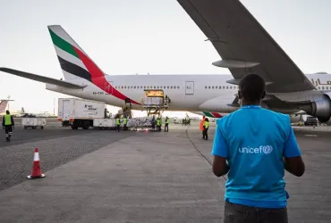 Lucas Odhiambo monitors the offloading of a shipment of over 880,000 Moderna COVID-19 vaccines donated by the United States at Jomo Kenyatta International Airport in Nairobi, Kenya.