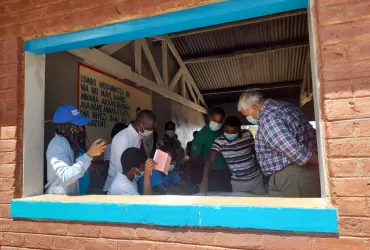 Dr Sibongile Chikombore (left) and her supervisor, Dr Bejoy Nambiar (right) engaging with the Chang'ambika Health team during a planning visit in Chikwawa district, Malawi.