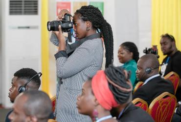 Belyse Inamahoro Bushombo is a UN Youth Volunteer Communications Assistant with UNDP, here taking some photos at the African Climate Week 2022 in Libreville, Gabon.