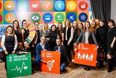 Tereza Sacha celebrating the 74th anniversary of the UN with her colleagues at UNDP Moldova.