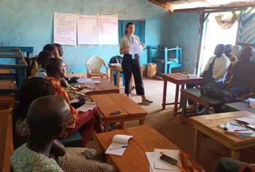 UN Volunteer, Natalia Peshkova, speaks to local journalists in Kaga Bandoro on their crucial role in helping communities understand and engage with the peace process.