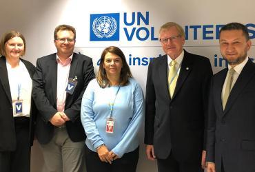 Toily Kurbanov (right) and Helge Espe (second from right), Senior Adviser for UN and International Networks with Norec, together with UNV and Norec teams during the partner consultations in Bonn.