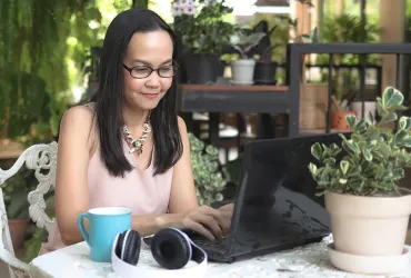 Young woman working online.