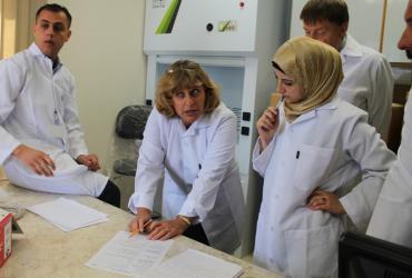 Forensic expert from the Palestinian Forensic Laboratory working analysis of samples of drugs and chemicals 