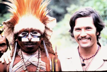 UN Volunteer Jerome Montague with a Biami warrior at Nomad River, Papua New Guinea, in 1978.
