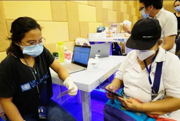 National UN Volunteer Youth Engagement Officer, Johanna Erroba (left), serves with UNDP in the Philippines. Here, she is seen conducting data validation in households for the enrollment of citizens in a digital wallet.