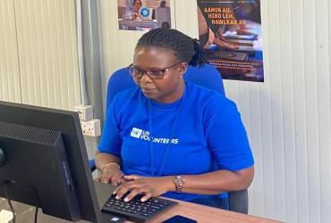 Stella Apolot Epudu, UN Volunteer Electoral Officer with United Nations Mission in Somalia, during her working hours at the UN regional office in Kismayo, Somalia.
