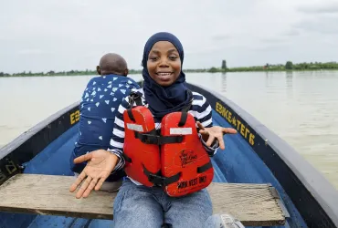 UN Volunteer Rafiat Atanda films a documentary showing UNODC’s work in communities across Bayelsa State, Nigeria.