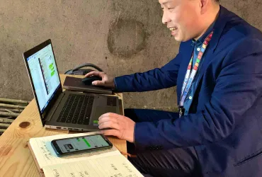 UN Volunteer Zhao Tiansong provided support from a remote office during COVID-19 response efforts 