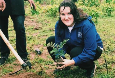 Louise Bergman (Sweden), UN Volunteer Project Support Officer with IOM Rwanda, on the UN Day of Tree Planting.