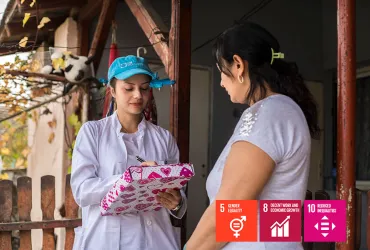 Sabina Drmaku (left) is from the Roma community and serves as a UN Community Volunteer with UNDP. Here she is seen at the Community Health Centre in the municipality of Beočini, Serbia.