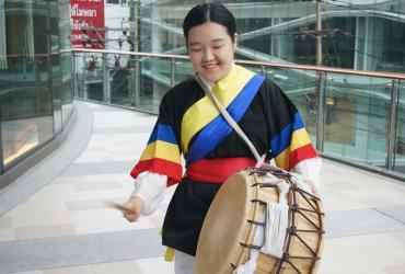 Sodam Baek, UN Volunteer Associate Communications Officer, participating in a Korean Traditional Percussion Band, performing in Bangkok, Thailand. 