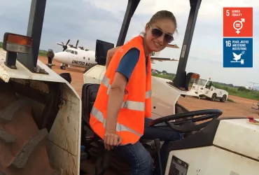 UN Volunteer Air Operations Assistant Ia Sakaadze serves with UNMISS in South Sudan, controlling safe ground operations on the airfield.