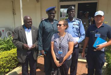 Michele De Aquino (centre fore, Switzerland), UN Volunteer Rule of Law Officer with UNMISS, with counterparts during her assignment in the field.